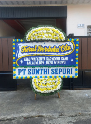 Papan Bunga Duka di Teluk Kimi