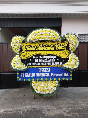 Papan Bunga Duka di Teluk Kimi